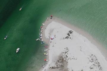 Aerial view of vessels on barrier island beach